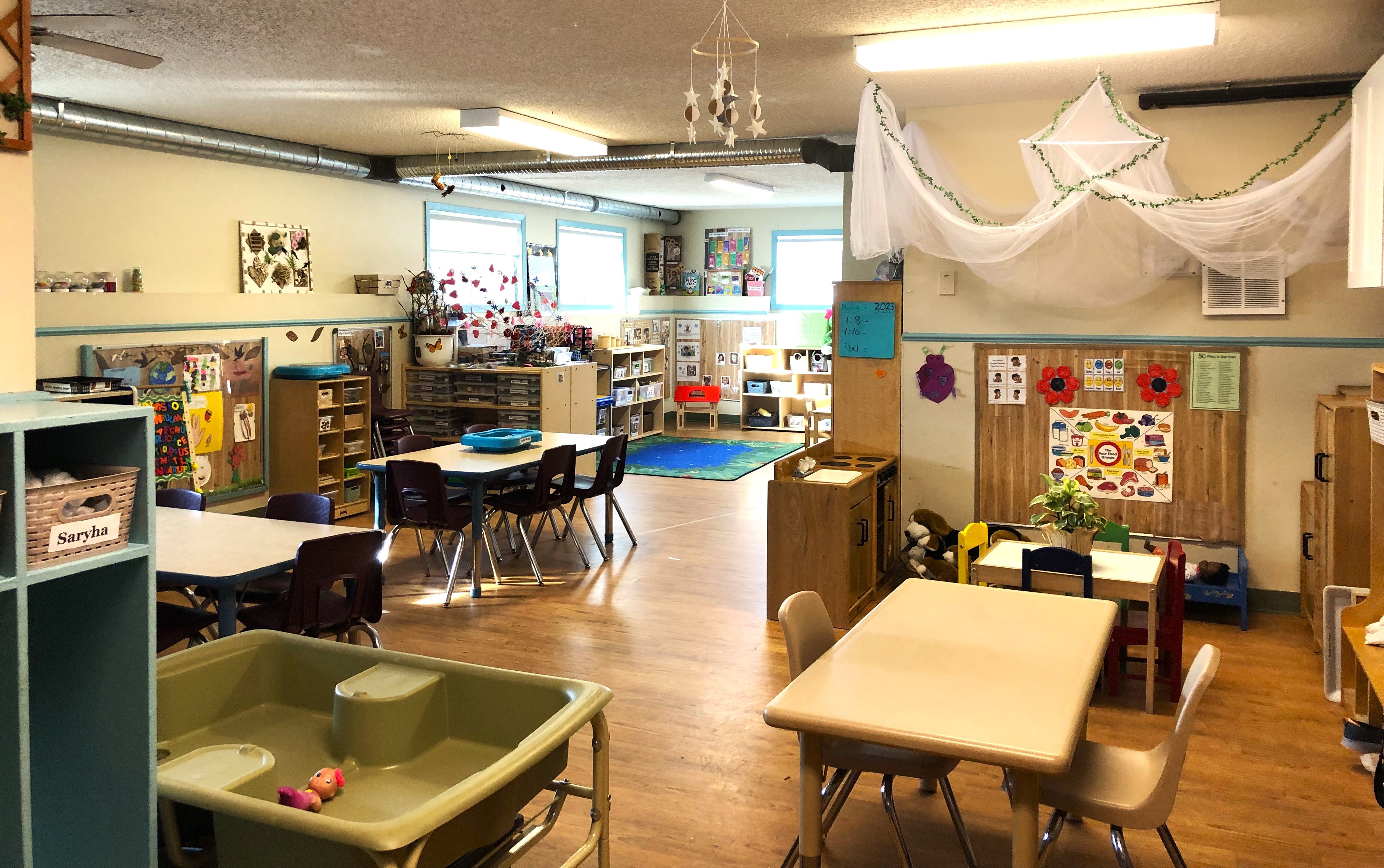 Dedicated staff nurturing children at BrightPath Daycare in Falconridge.